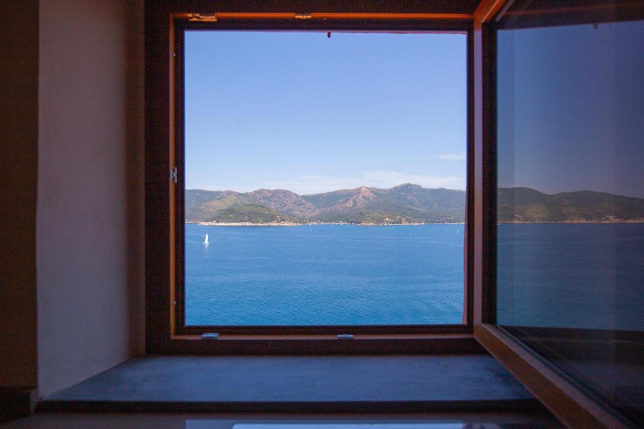 Helloelba Appartamento Il Faro Портоферрайо Экстерьер фото